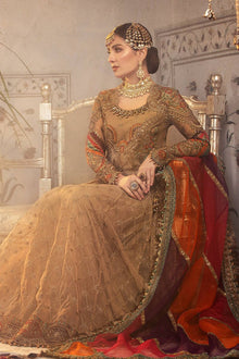 Antique gold embroidered organza formal suit sitting model view
