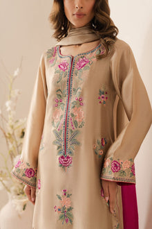 Beige lawn suit neckline and floral embroidery close up
