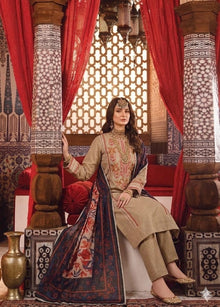 Beige embroidered lawn 3 piece suit seated model view with printed dupatta