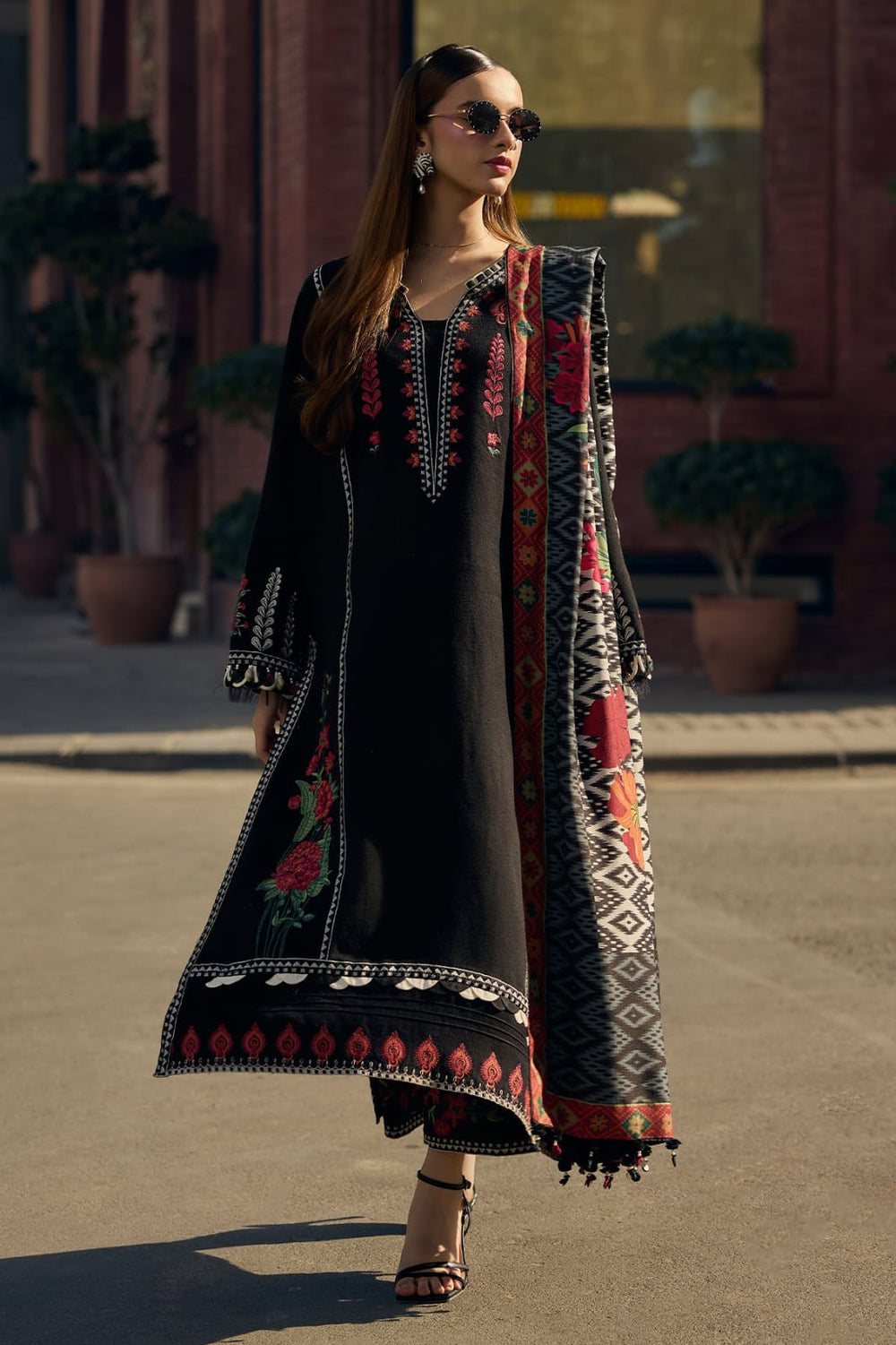Black embroidered lawn 3 piece unstitched suit model walking view