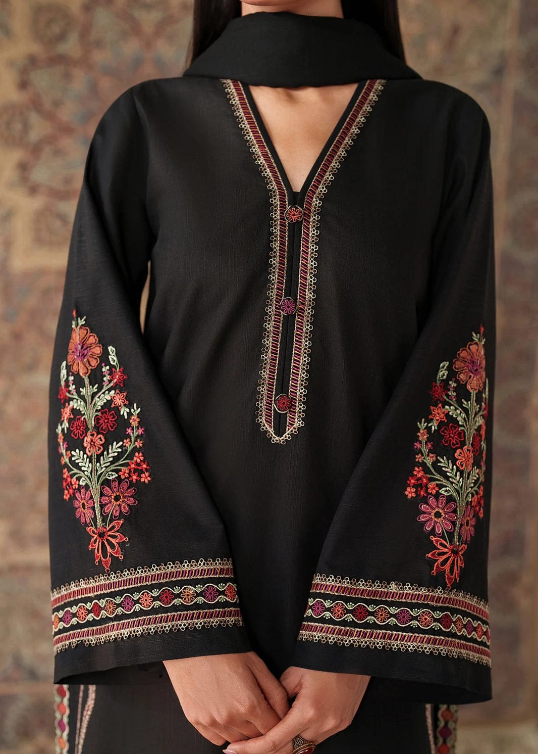 Black embroidered lawn suit close up showing neckline and sleeves