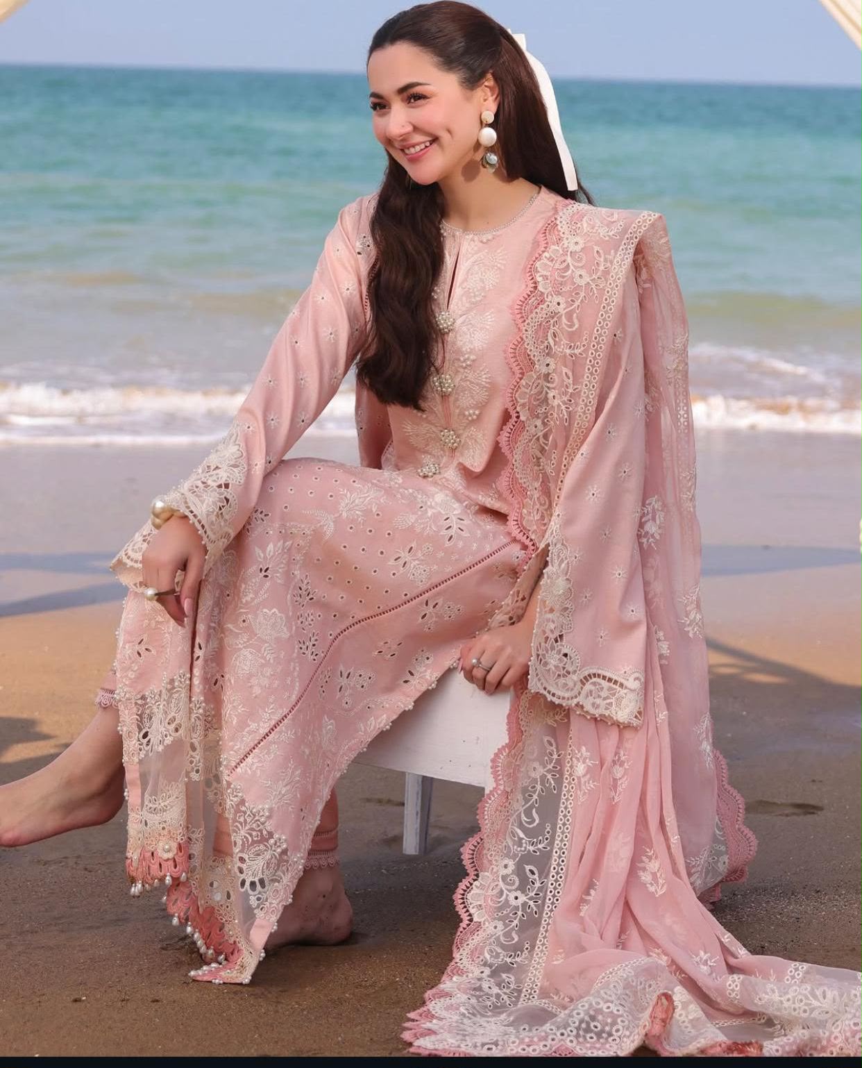 Blush pink embroidered lawn suit sitting model view with chiffon dupatta
