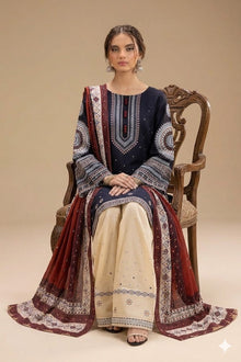 Deep navy embroidered lawn suit sitting model view with maroon printed dupatta
