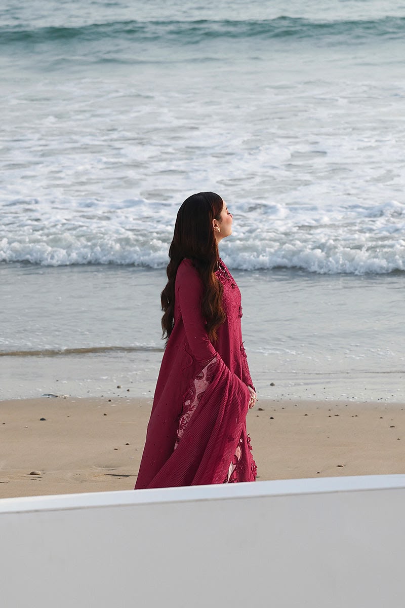 Deep plum embroidered cotton suit beach model view
