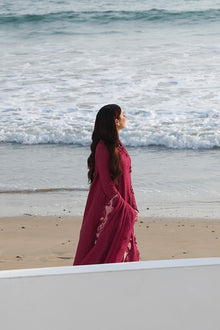 Deep plum embroidered cotton suit beach model view
