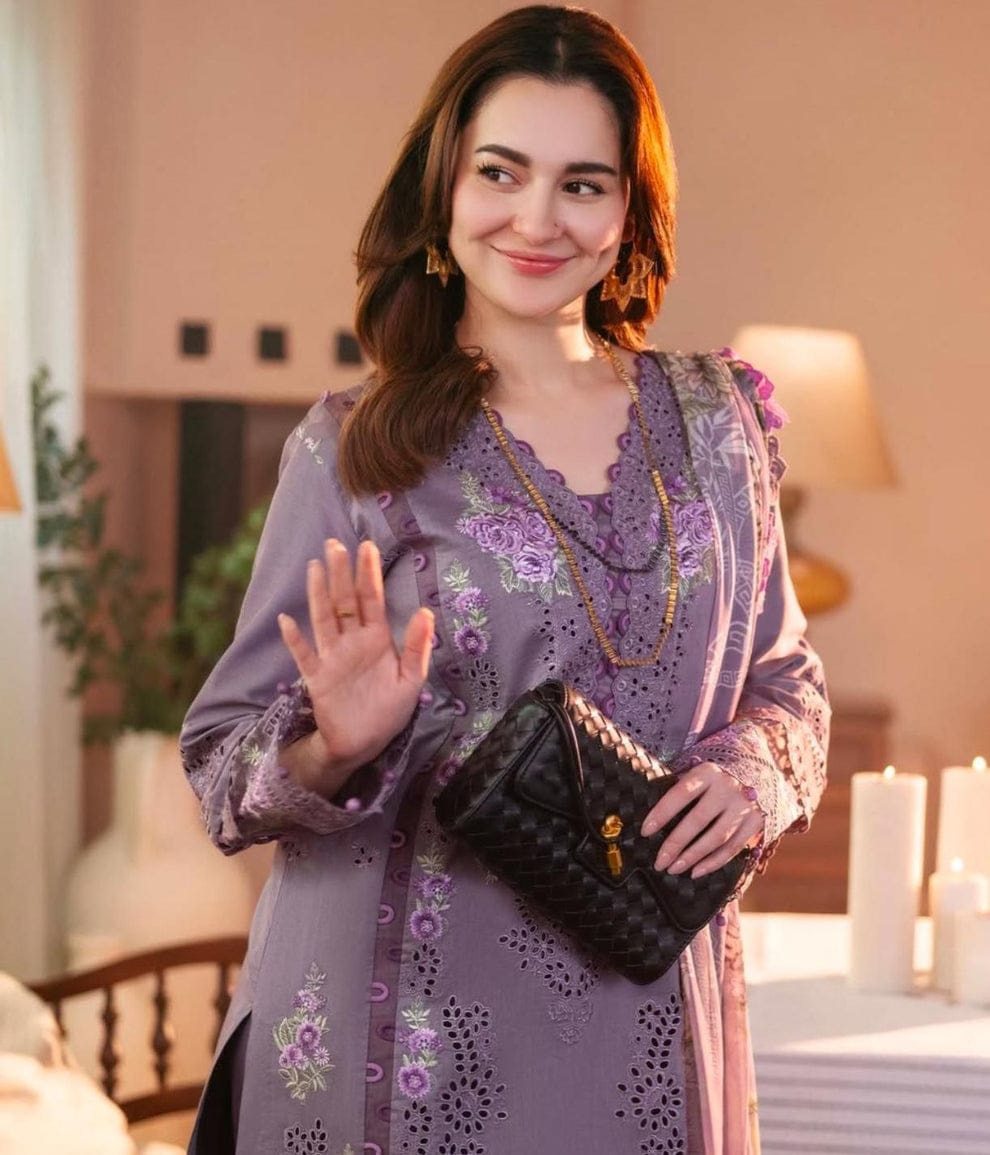 Dusty lavender lawn suit neckline and floral embroidery detail
