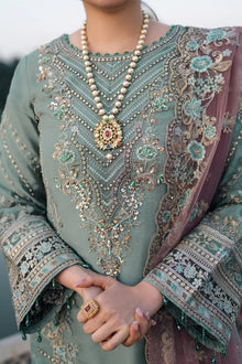 Dusty sage green chiffon suit neck embroidery and handwork closeup
