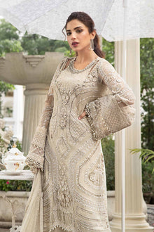 Ivory chiffon suit with adda work neckline and heavy embroidery detail