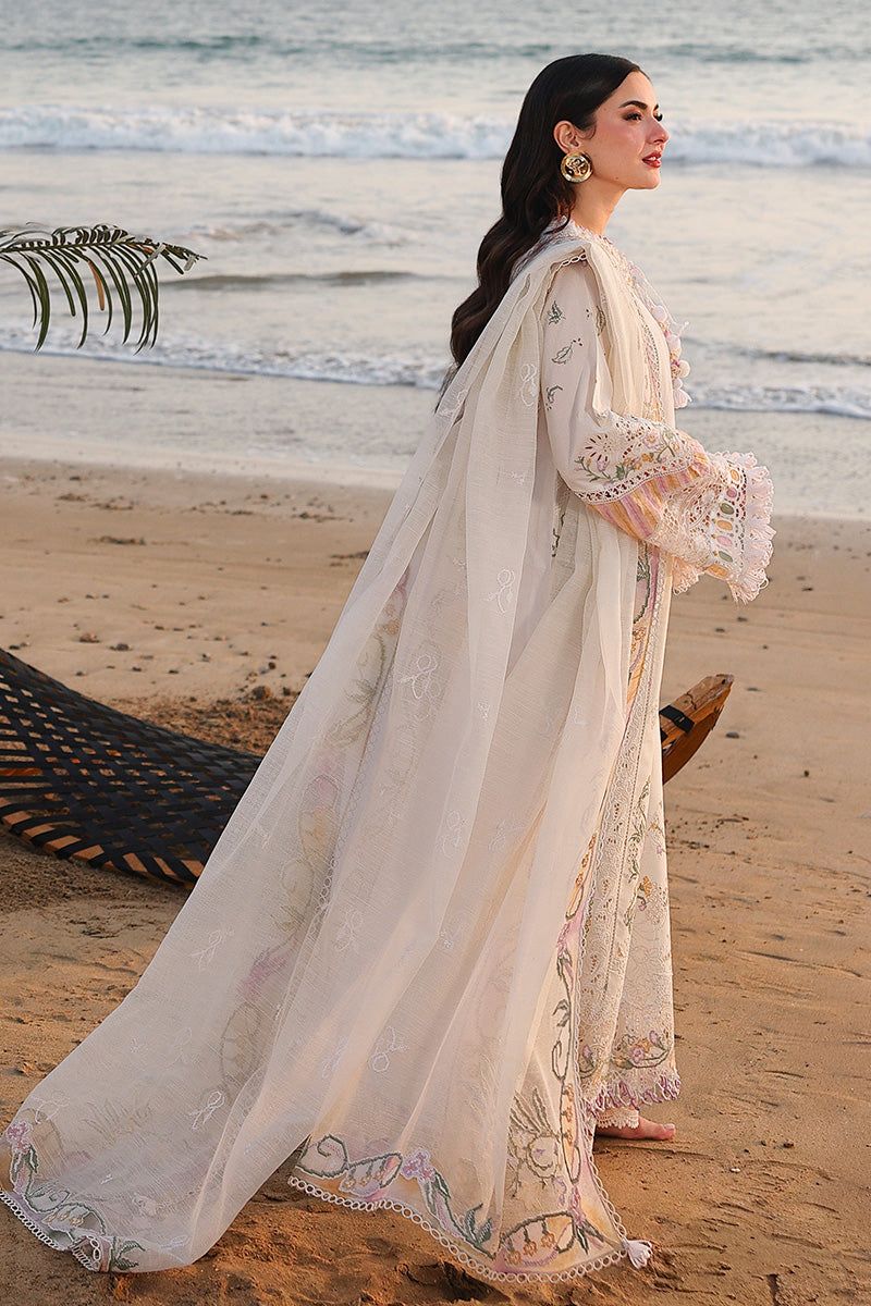 Ivory pastel cotton suit with embroidered khaddi net dupatta side model view
