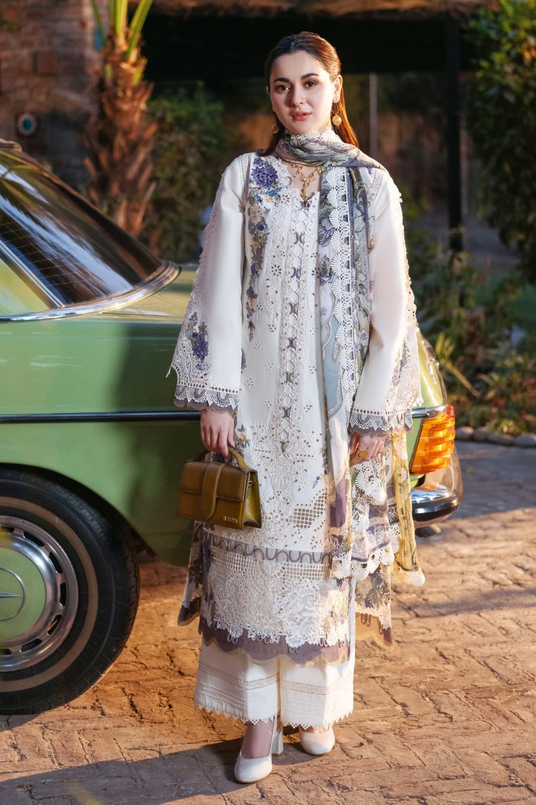 Ivory white chikankari embroidered lawn 3 piece unstitched suit front model view

