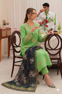 Lime green embroidered lawn 3 piece suit seated model view