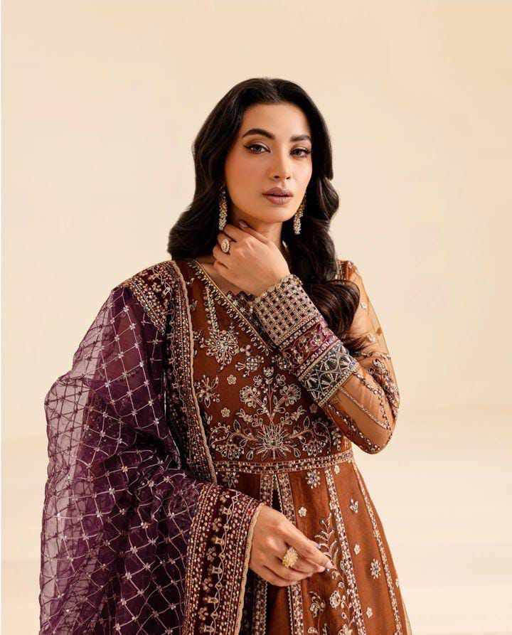 Rust brown net frock closeup with adda work body and embroidered sleeves