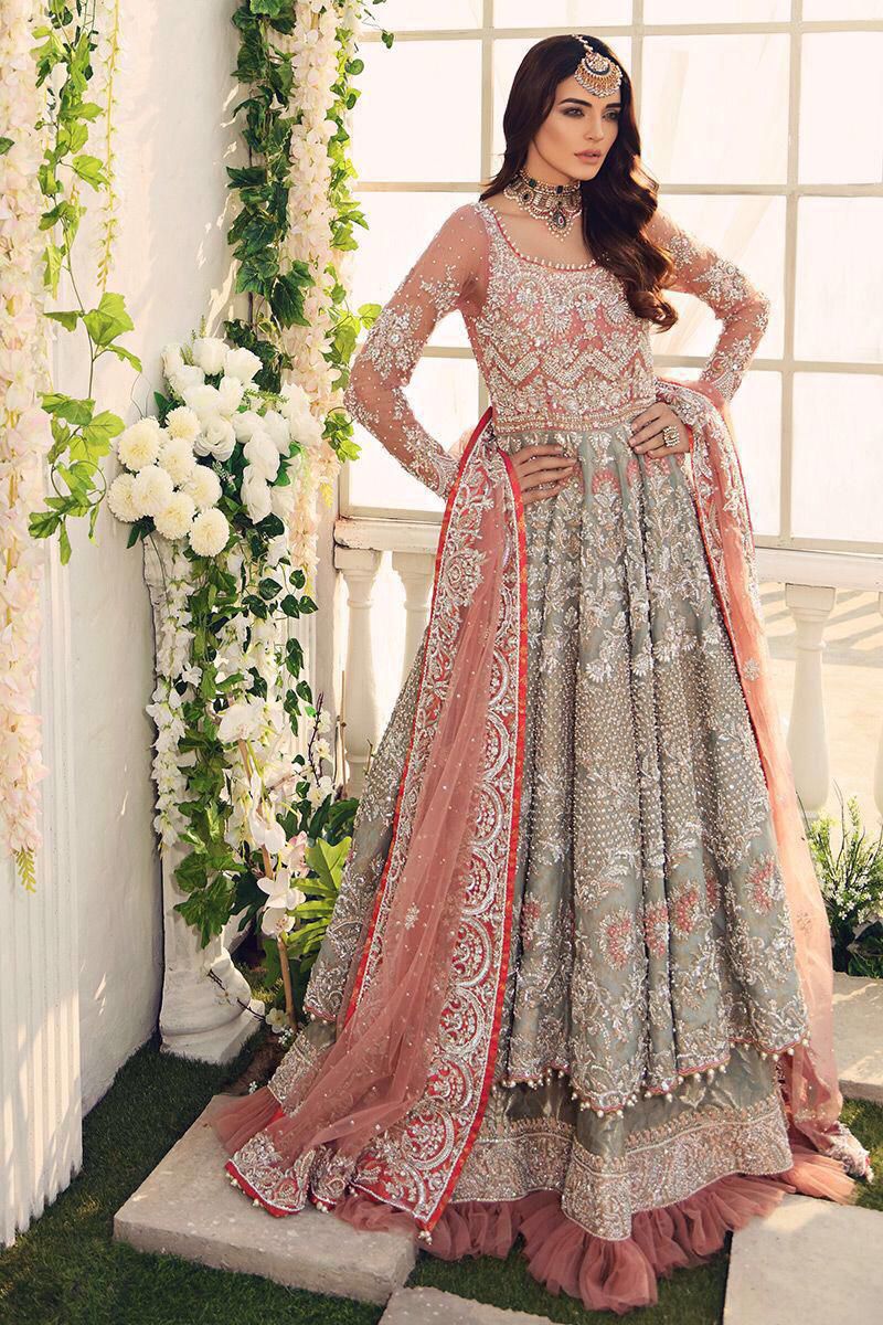 Silver grey embroidered net frock suit with peach embroidered dupatta
