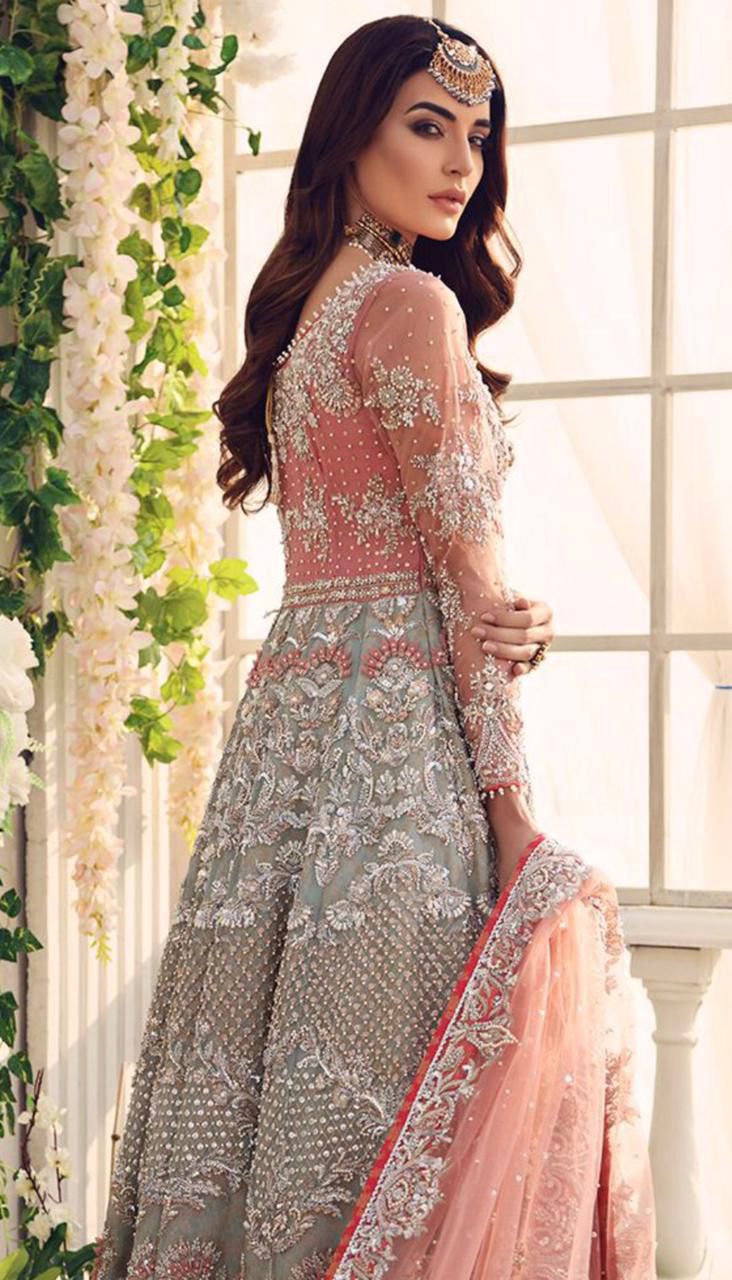 Silver grey net frock back side model view with peach dupatta
