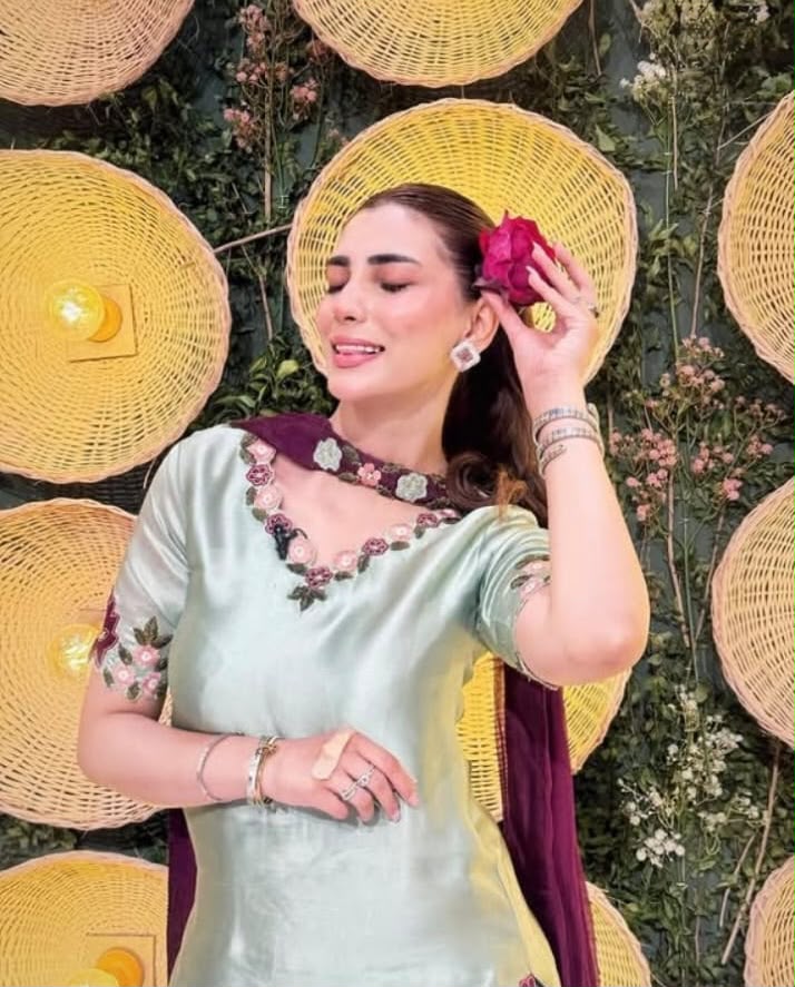 Soft mint embroidered silk suit neckline and sleeve detail
