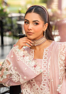 Soft pink chikankari cotton suit neckline and embroidered sleeve detail