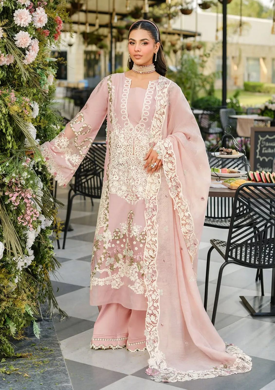 Soft pink heavy embroidered chikankari cotton 3 piece unstitched suit front model view